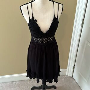 Flirty black high Lo sundress. Size small.